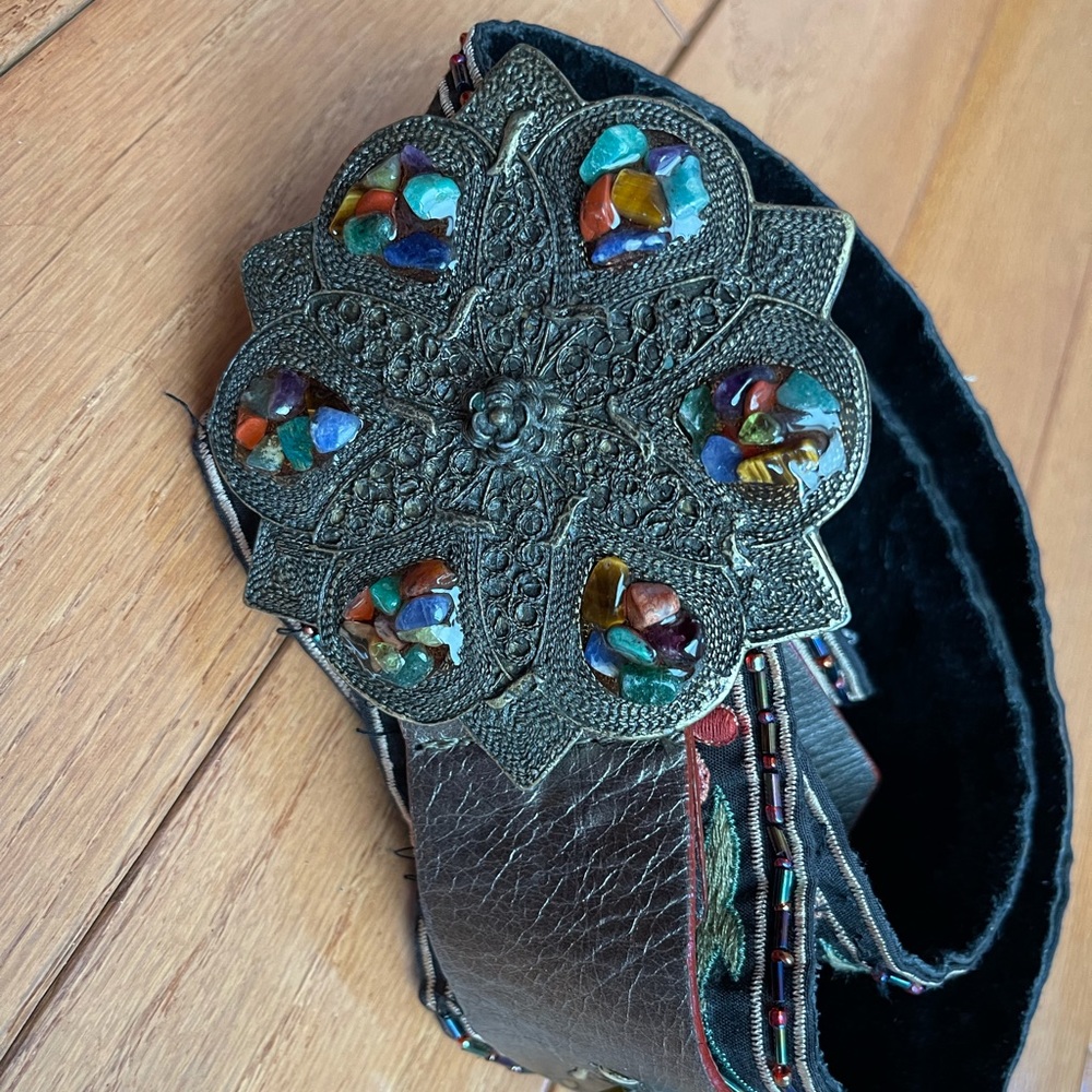 Belt with metal medallion flowers